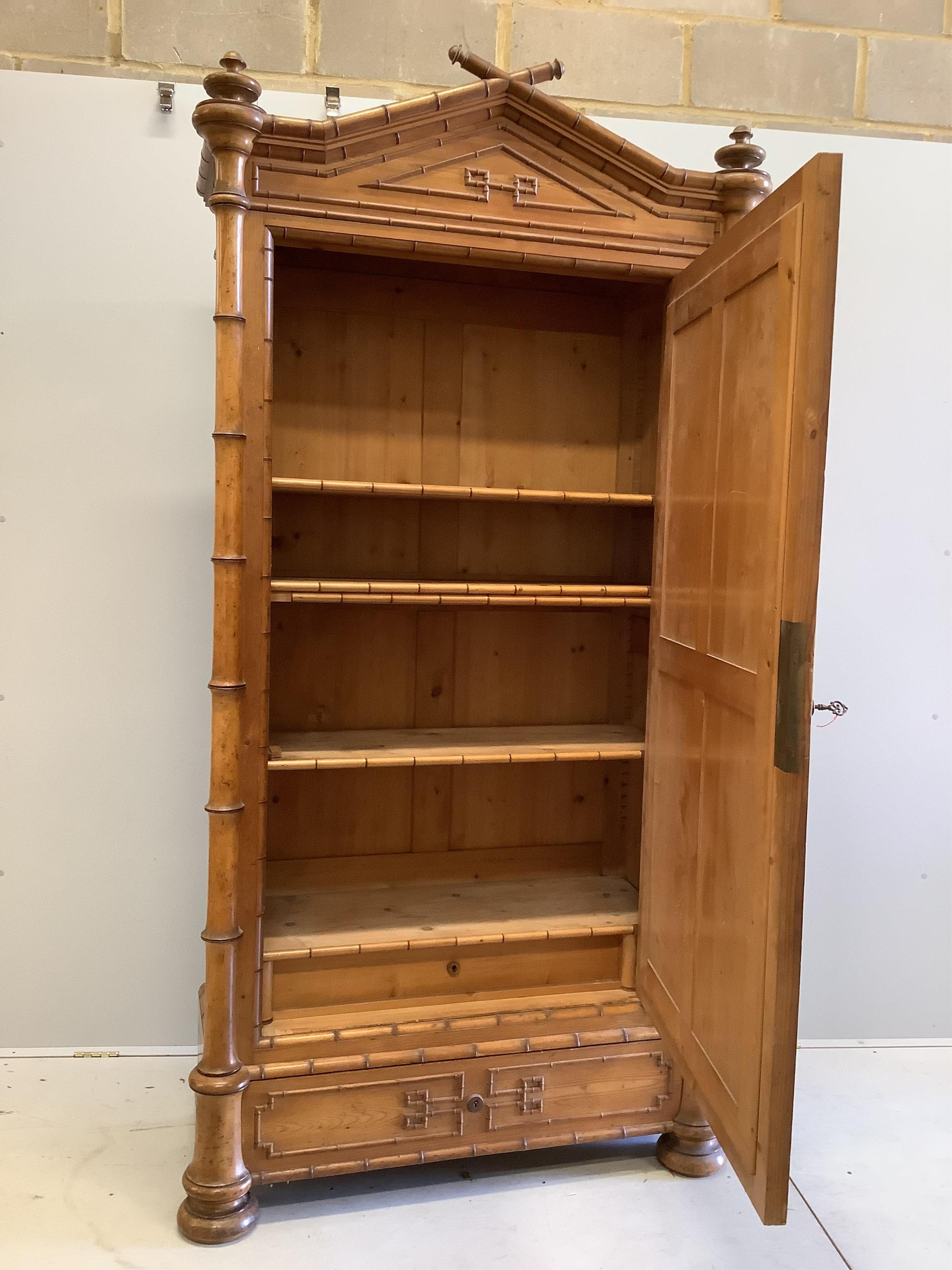 A late 19th century French bamboo and pine armoire, width 122cm, height 224cm. Condition - good condition, mirror looks later